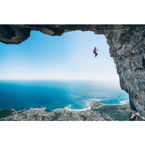 Micky Wiswedel (ЮАР). Альпинист Jamie Smith  осваивает новый маршрут на Столовую гору в Кейптауне. Победитель в категории «Крылья». Red Bull Illume Image Quest 2016   